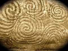 This is a photo of the detail spirals at Newgrange, Ireland.